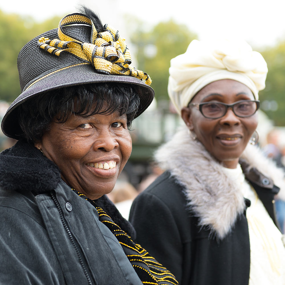 Women outside Buckingham Palace, London